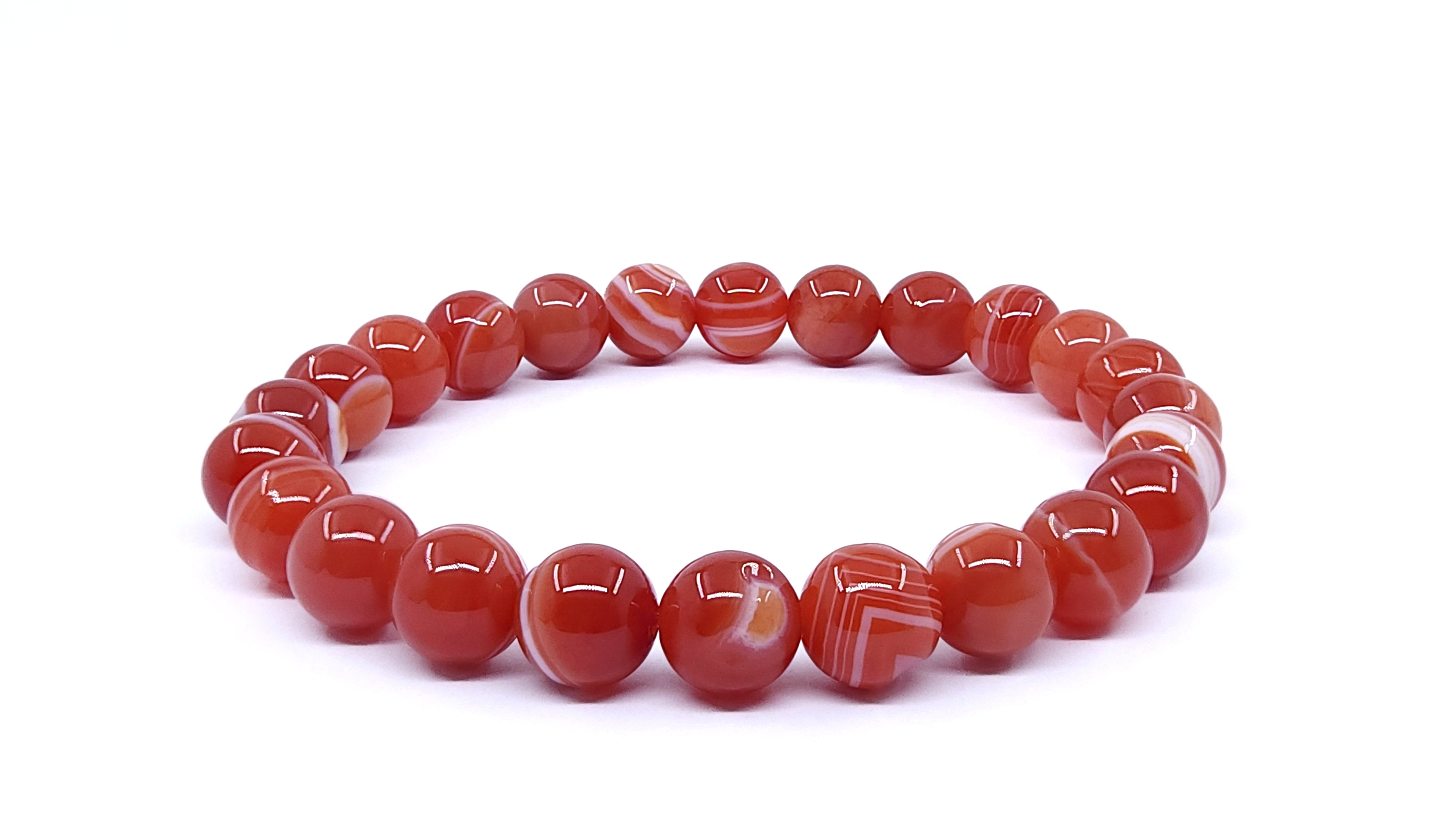 Elegant Think Beads Orange Striped Agate Bracelet showcasing vibrant bands and a polished finish, perfect for adding a touch of natural beauty to your style.